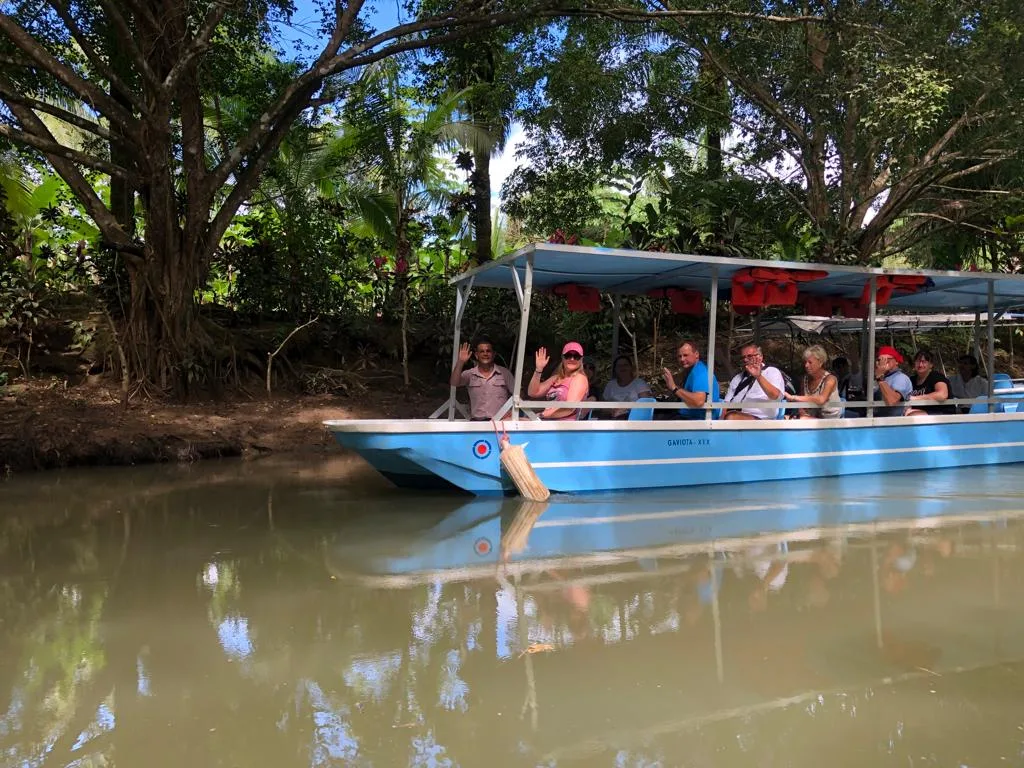 Guide Randy Rivera with guests on a Damas Island mangrove boat tour near Manuel Antonio, Costa Rica